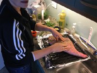 2017-04-16 11-38-28 84d52a5d  rubbing the gigot with rosemary and olive oil